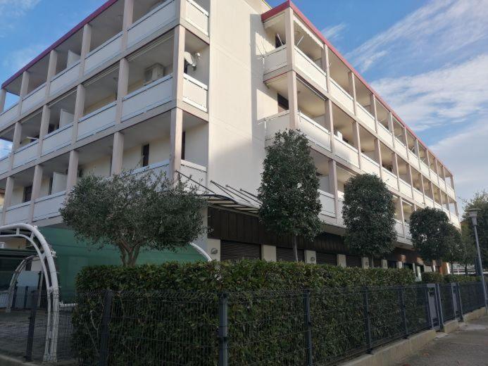 Condominio Quadrangolo-Gemini Бибионе Екстериор снимка